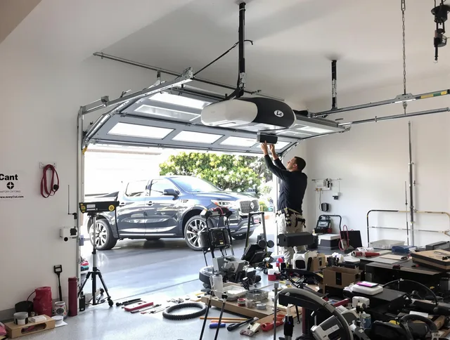 Anaheim Garage Door Repair specialist installing smart garage door opener system in Anaheim home