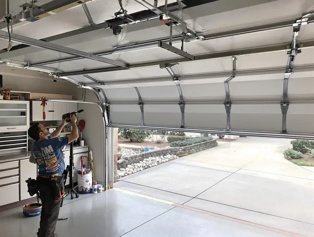 Garage door track repair service by Anaheim Garage Door Repair in Anaheim